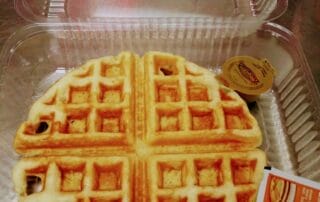 Fresh waffle with butter and syrup