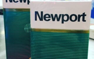 Two Newport cigarette packs on a counter